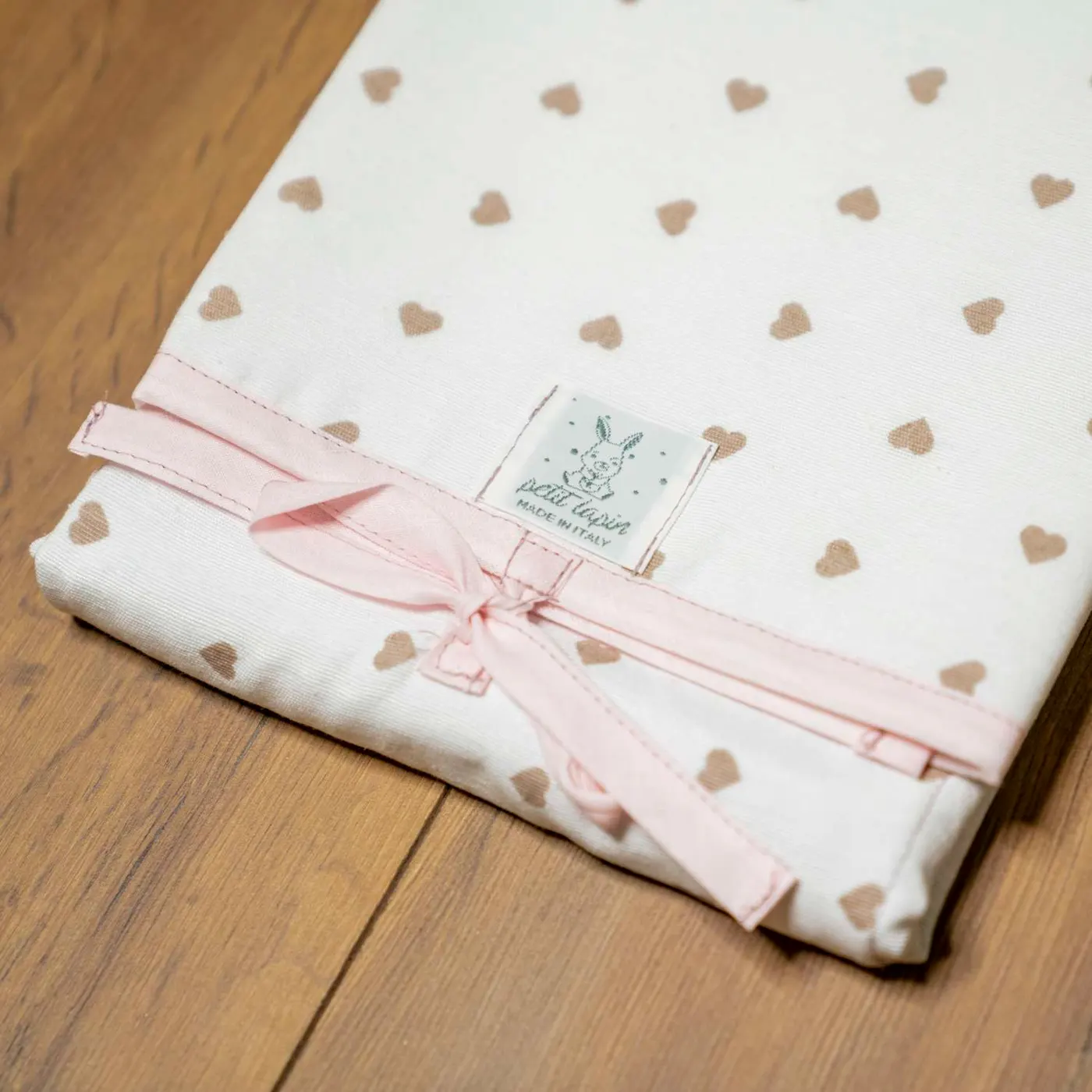 Fasciatoio da viaggio – Bianco – dettagli rosa
